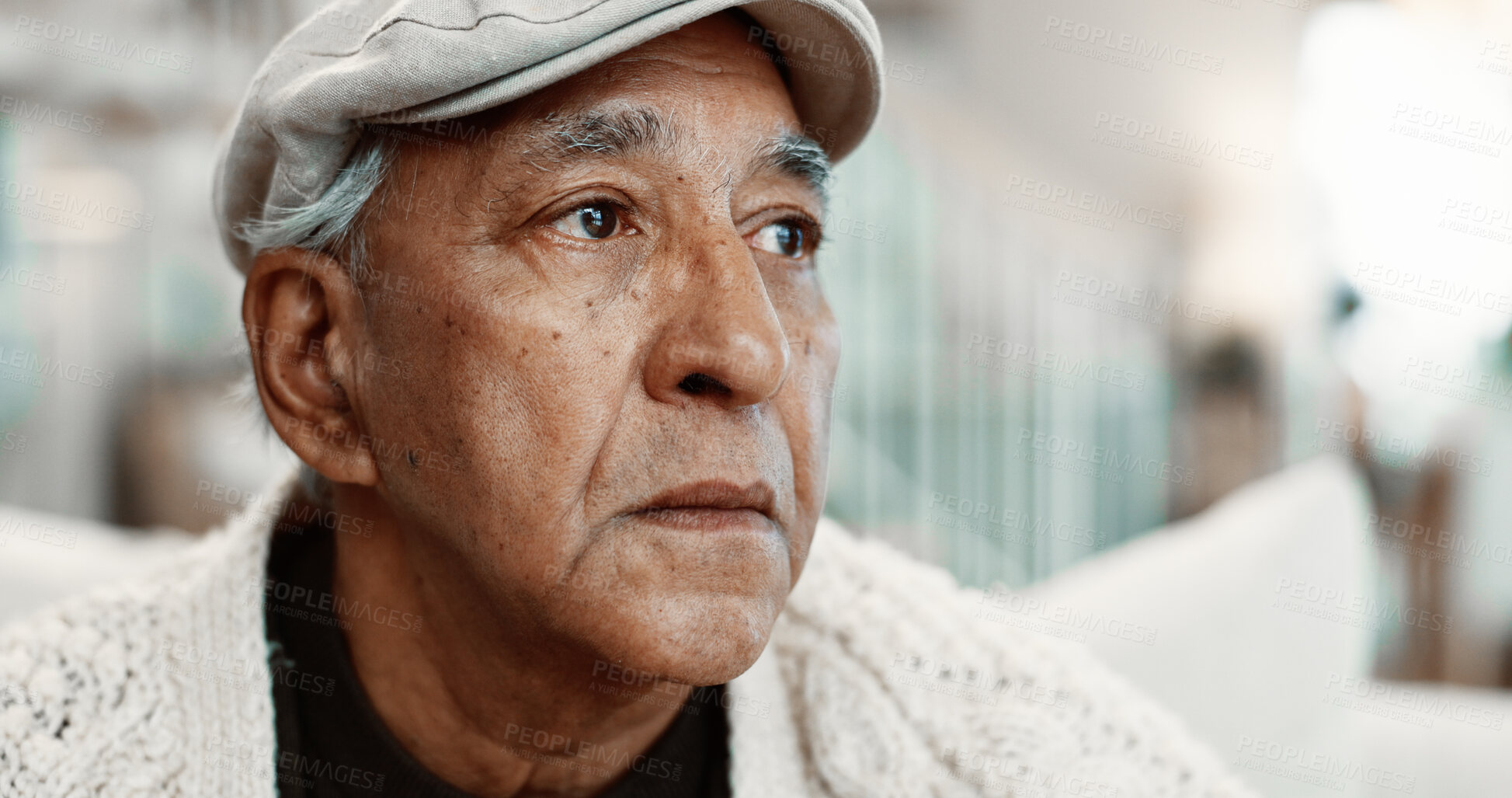 Buy stock photo Thinking, serious and senior man on sofa in home with reflection, nostalgia or reminder of retirement. Sad, memory and elderly person in living room for vision, pension or loneliness in apartment.