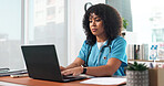 Medical, review or woman in hospital with laptop, research or patient diagnosis in telehealth. Healthcare, reading or doctor in clinic with tech, online consulting or case report for treatment plan.