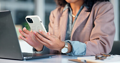 Buy stock photo Hands, laptop and phone with corporate woman at desk in office for communication or feedback. App, technology and typing on mobile with business employee at work for email, review or text message