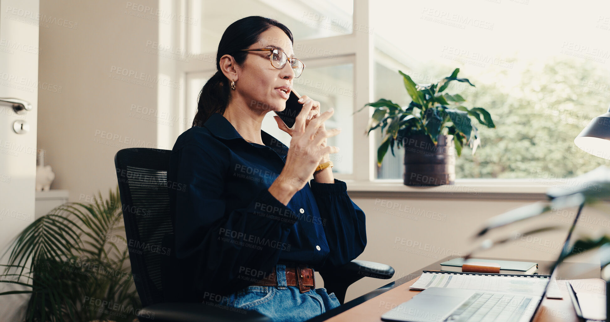 Buy stock photo Phone call, talking and woman in office for business negotiation, event planning or communication. Mobile, mature person and planner speaking to contact for guest list, venue reservation or booking