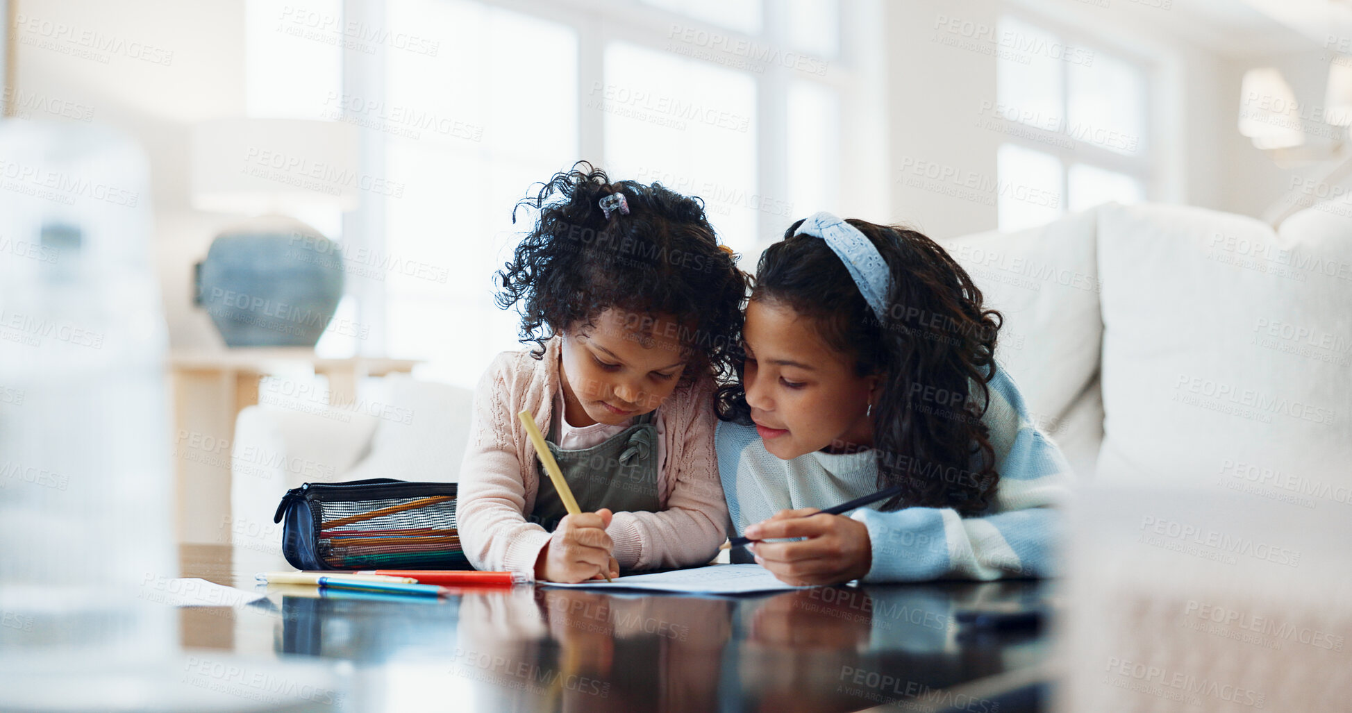 Buy stock photo Children, siblings and learning with homework for education, studying or academic development in home. Girls, sister and helping elementary student with drawing, assignment or school project in house