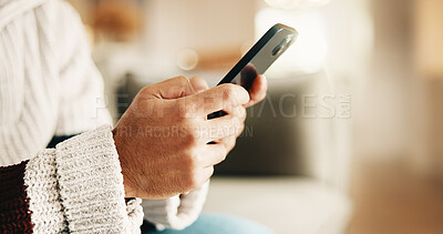 Buy stock photo Message, online and hands with phone, home and communication with contact on social media or website. Scroll, app and person with mobile, texting and networking with internet connection in house
