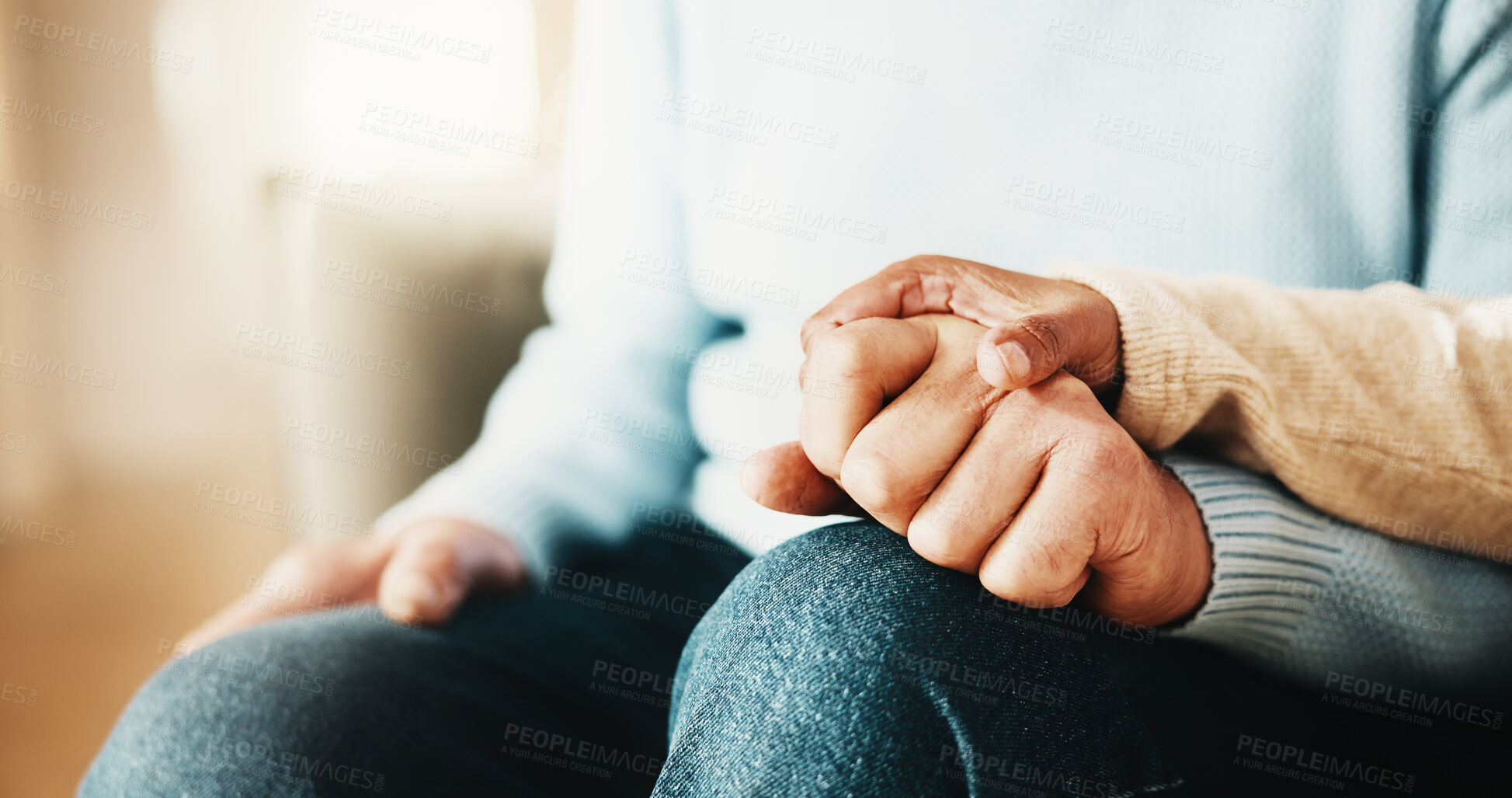 Buy stock photo Old couple, support and holding hands with partner in house, retirement and relationship commitment. Marriage, solidarity and senior people on break, physical touch and comfort with love in home