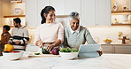 Smile, family and cooking in kitchen with tablet, meal prep and online recipe for healthy food. People, grandmother and digital at house with vegetables, tutorial video and culinary skills for lunch