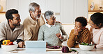 People, cooking and big family in kitchen for meal prep, supper and prepare food for bonding in home. Generations, happy child and tablet for online recipe, conversation and connection for holiday