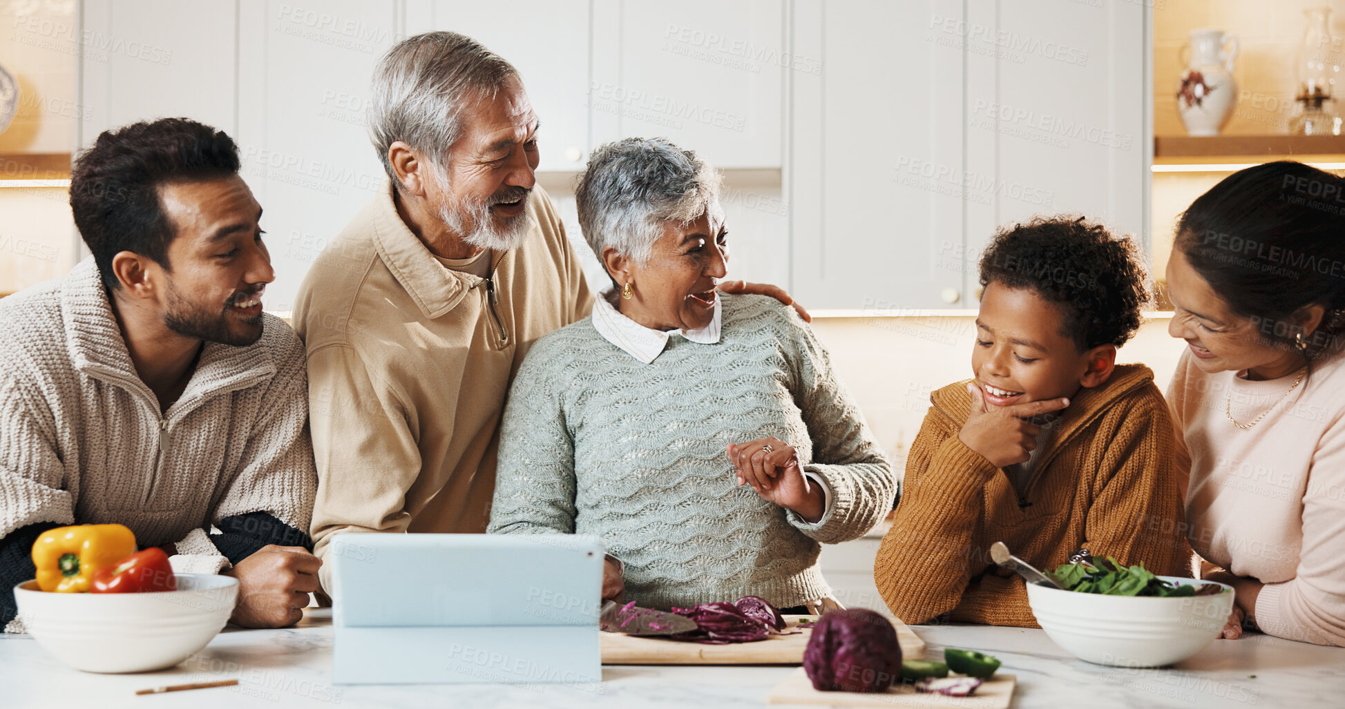 Buy stock photo People, cooking and big family in kitchen for meal prep, supper and prepare food for bonding in home. Generations, happy child and tablet for online recipe, conversation and connection for holiday