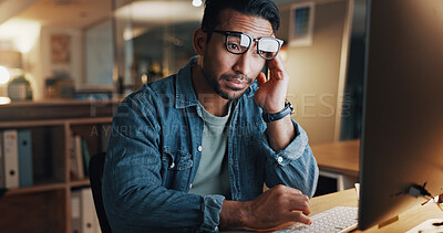 Buy stock photo Night, headache and tired man in office with computer, glasses and fatigue from software development. Late, person and developer in business with desktop, migraine and burnout from debugging problem.