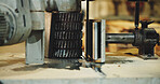 Manufacturing, factory and closeup of woodworking machine, restoration or carpentry power equipment. Craftsmanship, design and cutter to shape timber, construction and remodeling tool in workshop