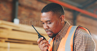 Buy stock photo Black man, carpenter and talk in workshop with radio, discussion and schedule for timber delivery. Thinking, person or chat with tech in warehouse for carpentry, instructions and furniture production