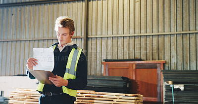 Buy stock photo Documents, man and carpenter in workshop with research for industrial project at small business. Clipboard, paperwork and woodworker with inventory for furniture manufacturing, schedule or production