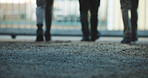 Legs, construction and people on concrete rooftop for building structure or durability. Group, architect or employees with strong floor for architecture development, security or safety on space
