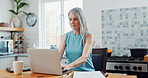 Mature, woman and typing in home with laptop, reading payslip or income budget for household expense. Person, research and check salary in house with computer, financial planning and utility bills.