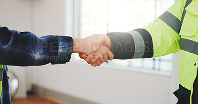Buy stock photo Meeting, architect and deal with handshake in building for construction agreement or renovation. People, employees or colleagues shaking hands with window for architecture partnership or teamwork