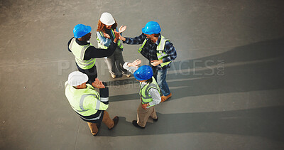 Buy stock photo Construction, team and unity with high five in meeting or above for success, winning or mission. Top view, architect or group of contractors with touch or celebration for completion or done on space
