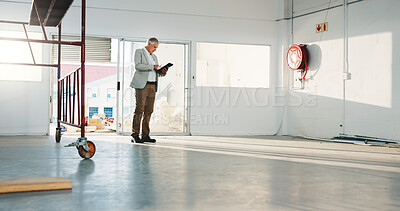 Buy stock photo Mature, man or architect with tablet in building for construction planning, safety or security check. Male person, civil engineer or inspector with technology for property management or development