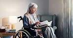 Old woman, wheelchair and book with relax in home, reading and wellness with calm retirement hobby. Novel, language learning or fiction with disabled person in bedroom, break and story for self care