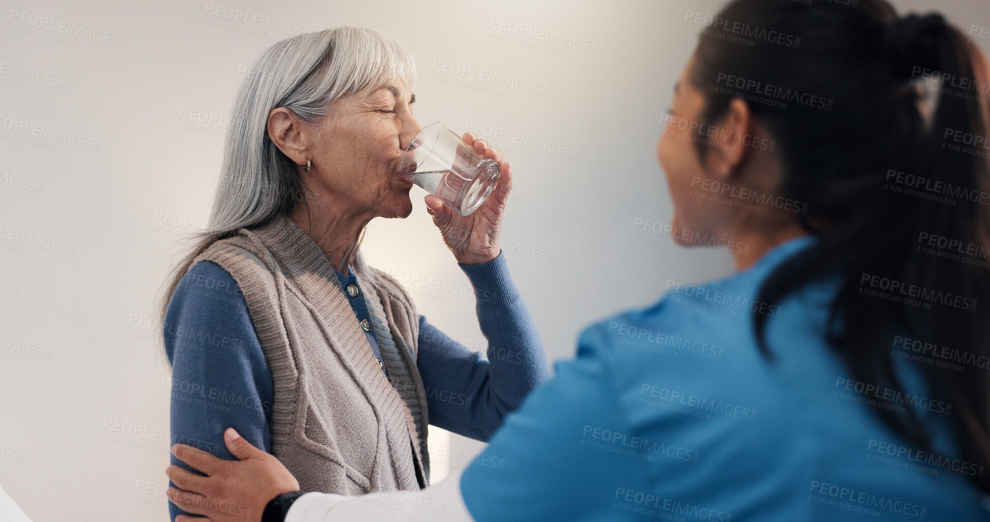 Buy stock photo Nurse, patient and senior care with drinking water for health, wellness or hydration for medical help. Support, caregiver and old woman with beverage, electrolytes or fluids for healthcare in home