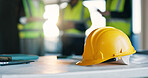 Architect, helmet and meeting in office for safety inspection, workplace injury prevention and rules. People, collaboration and hard hat for construction project, PPE compliance or protocol for team.