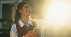 Phone, happy and businesswoman in city with email, feedback and texting for finance report. Flare, technology and financial advisor with cellphone for update on investment growth in urban town.