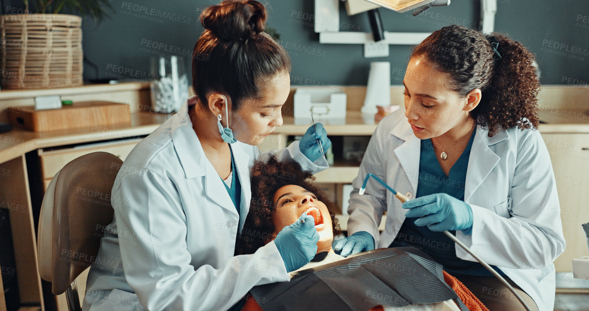Buy stock photo Checkup, dentist and team with woman for toothache, equipment and clinic for healthcare and dental. Oral hygiene, gloves and doctors with patient, exam and procedure for teeth whitening appointment