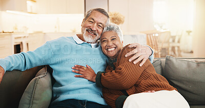 Buy stock photo Old couple, portrait and hug in lounge, retirement and connection with partner on break or marriage. Senior people, embrace and bonding with spouse, care and happy for relationship commitment in home