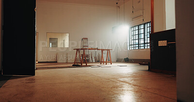 Buy stock photo Building, renovation or interior design with construction for property development or maintenance. Empty, space and architecture with table, floor or lens flare for repair or work in progress on site