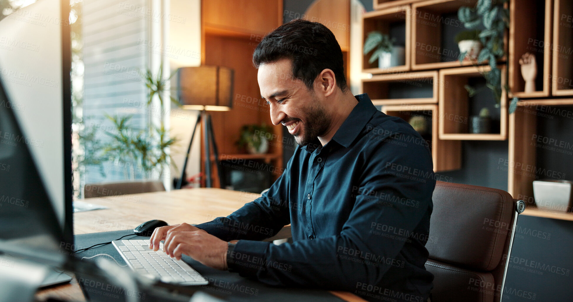 Buy stock photo Business man, typing and smile in office for app development, website design or coding. Person, computer and building software program for technology, programming and UX planning in workplace
