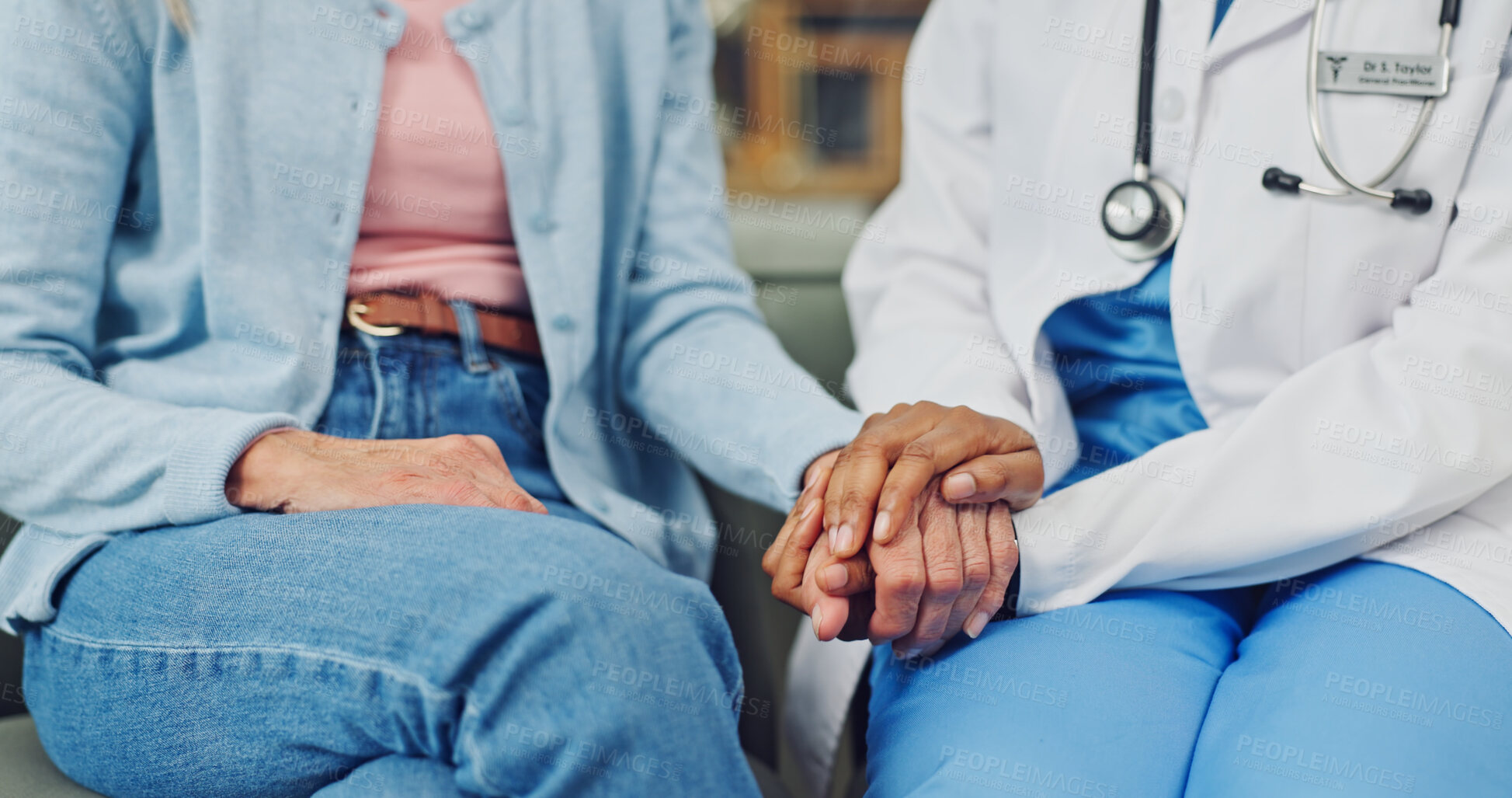 Buy stock photo Consultation, support and doctor holding hands with old woman for cancer diagnosis, empathy and help. Healthcare worker, senior person and assurance in office with sympathy, comfort or news of tumor