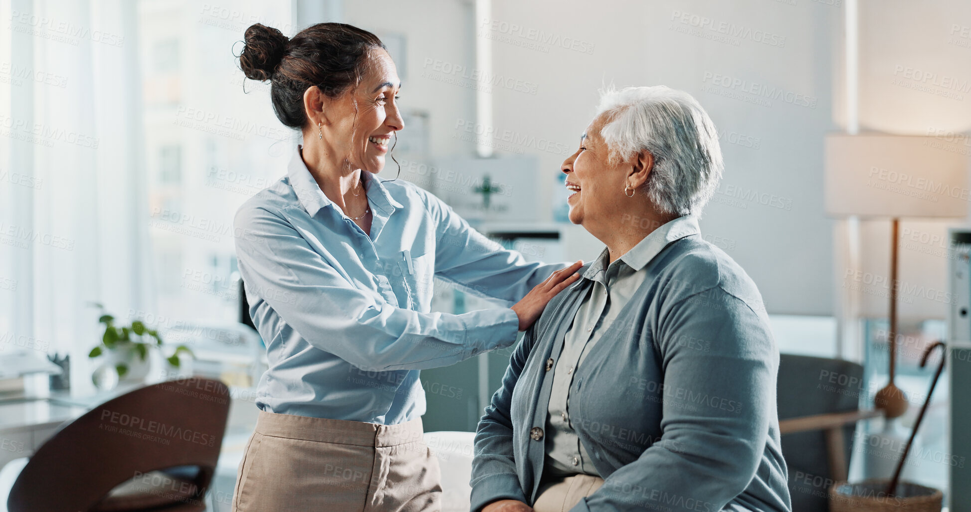 Buy stock photo Medical, old woman and doctor in hospital with smile, aging care and guidance in senior wellness. Assistance, patient and gp with checkup, clinical support or happy relationship in elderly healthcare