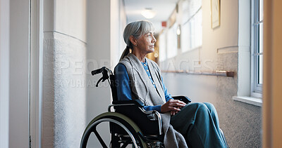 Buy stock photo Corridor, thinking and wheelchair with old woman in retirement home for memories or nostalgia. Flare, remember and senior person with disability at window for contemplation, ideas or morning view