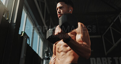Buy stock photo Fitness, thinking and man exercise with music and serious for training, muscle and self care. Earphones, workout playlist and person or health club membership for bodybuilding, strong and wellness