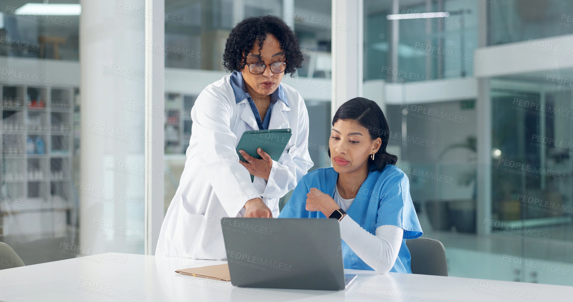 Buy stock photo Doctor, nurse and conversation in hospital with laptop, mentorship or medical research for diagnosis. People, talk and manager training intern in clinic with computer, advice and healthcare report.