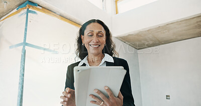 Buy stock photo Building, inspector and happy woman with tablet, online or quality assurance for property management. Construction site, inspection and mature person with tech, low angle and safety check update