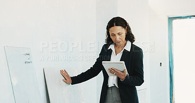 Buy stock photo Inspection, research and woman with tablet on construction site, safety check or property management. Building, inspector and mature person with technology, architecture and quality assurance update