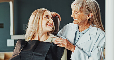 Buy stock photo Women, dentist and happy patient in clinic for dental hygiene, teeth treatment or appointment. Female person, orthodontist or smile on chair for tooth care, cleaning or oral healthcare in dentistry