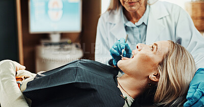 Buy stock photo Consulting, mirror and dentist with patient in clinic for teeth cleaning, oral hygiene and medical service. Healthcare, orthodontist and woman with cavity for dental care, appointment and wellness