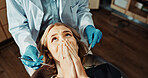 Patient, fear and woman with dentist in appointment, dental care or frightened of medical procedure. Clinic, above and person with stress for teeth exam, scared and checkup for oral health and help