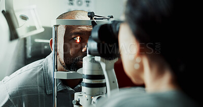 Buy stock photo Optometry, clinic and man with laser machine for eye exam, consulting and eyesight for vision. Healthcare, scanner and optician with patient for checkup, medical service and ophthalmology appointment