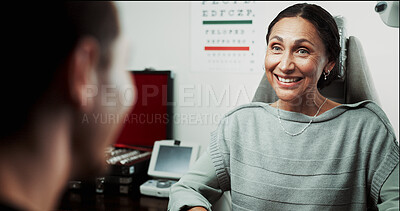Buy stock photo Optometry, consulting and woman in clinic talking for eye exam, testing vision and eyesight. Healthcare, happy and optician with patient for checkup, medical service and ophthalmology appointment