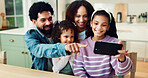 Family, happy and pointing with selfie in home for photography, memory or weekend together. Mom, dad and kids with smile, picture or capture moment for bonding, holiday or social media post in house