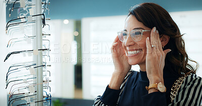 Buy stock photo Customer, optometry or happy woman with glasses in store for frame option, selection or choice. Female person, client or decision with smile or spectacles for vision, sight or shopping eyewear