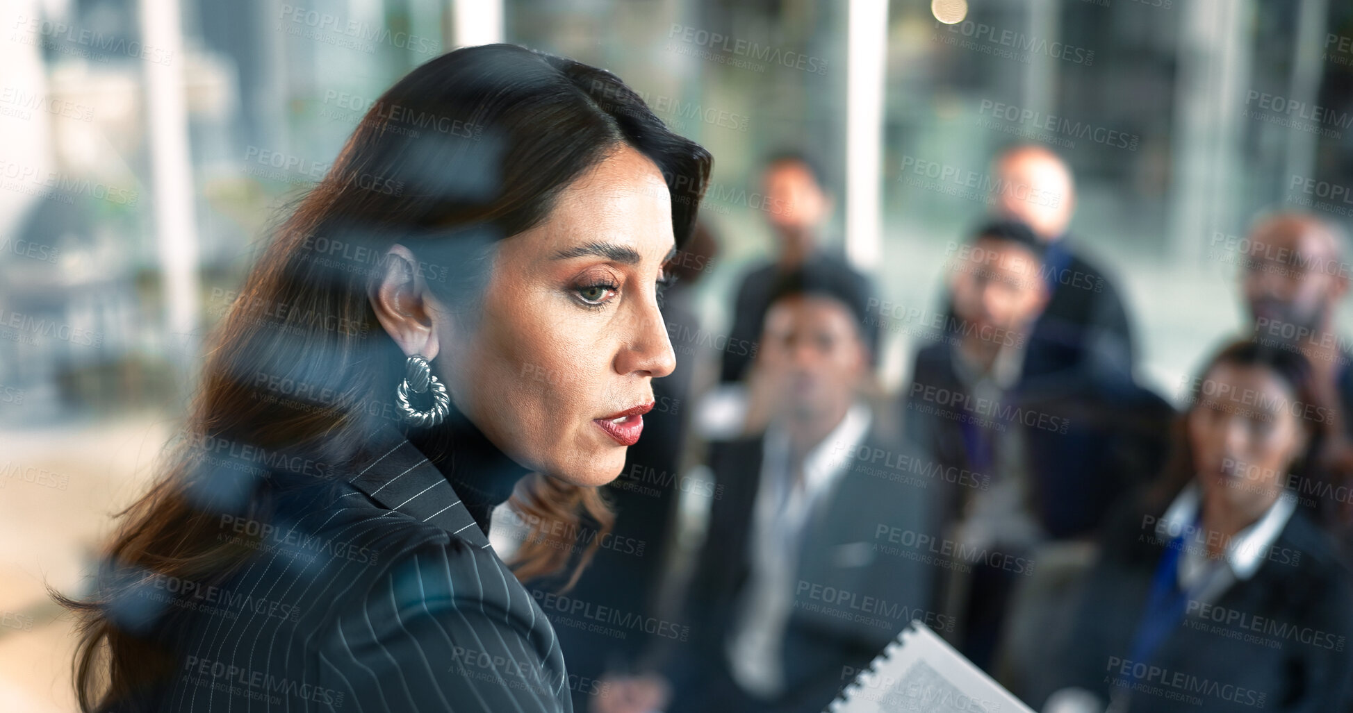Buy stock photo Document, speaker and presenting to audience in workshop for insight, coaching or wealth management. Seminar, mature woman and file for keynote address, industry trends or financial literacy at event