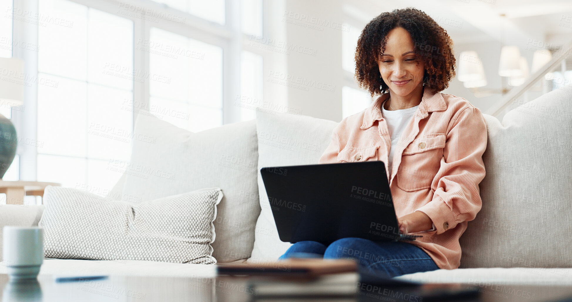 Buy stock photo Sofa, home and happy woman with laptop for remote work, journalism research or network connection. Mature person, freelancer or journalist with computer for online article or story on couch in house