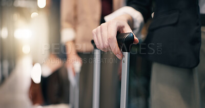 Buy stock photo Hands, person and waiting at airport with suitcase, checkin and flight departure for travel. Business, people and queue at terminal with luggage, passport control and border security for immigration