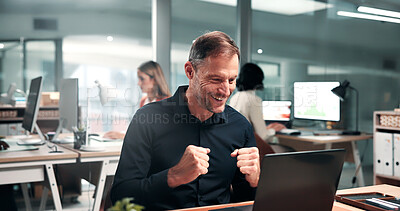 Buy stock photo Office, laptop and business man with fist pump for financial success, profit growth and investment. Happy, coworking and mature person with good news for budget approval, finance review and interest