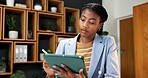 Business, black woman and reading in office with tablet, research and email for viewing schedule. Person, realtor and review in workplace with tech, buyer inquiry and pricing report for auction offer