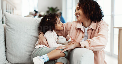 Buy stock photo Mother, hug and laugh in home with child, connection and funny joke for bonding together on weekend. Happy, woman and embrace daughter in living room with love, affection or care for family wellness.
