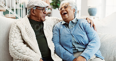 Buy stock photo Laughing, old couple and talking on sofa for love, bonding and funny together with healthy relationship. Man, woman and happiness in home, break or rest with joke, retirement and care in living room