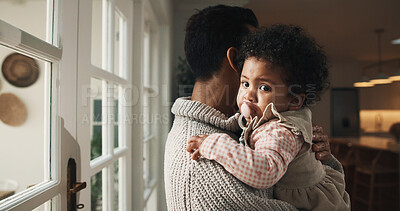 Buy stock photo Father, love and hug baby in house for care, child development and bonding together for growth. Dad, infant kid and embrace daughter with connection, safety and protection with parent for nurture