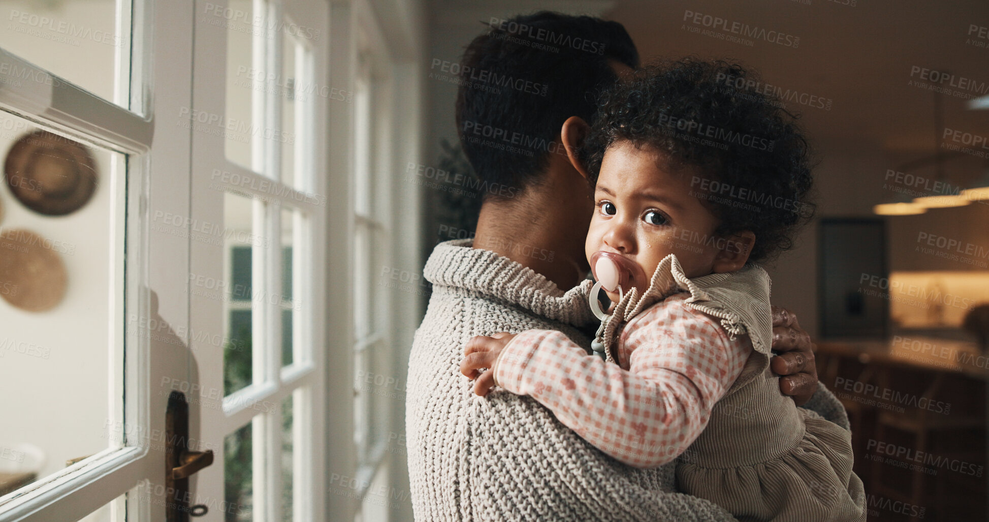 Buy stock photo Father, love and hug baby in house for care, child development and bonding together for growth. Dad, infant kid and embrace daughter with connection, safety and protection with parent for nurture